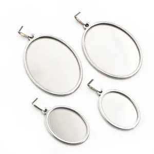 Macro shot of oval stainless steel pendant trays for DIY jewelry in various sizes