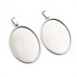 Macro shot of oval stainless steel bezel trays for DIY jewelry making with brushed finish