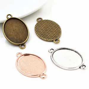 Détail de supports de pendentif ovales 18x25mm en alliage pour bijoux DIY en bronze