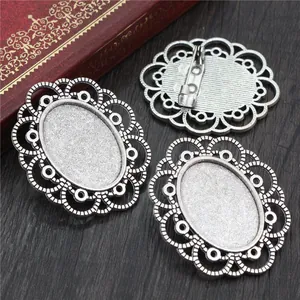 Three antique silver oval brooch base settings with hollow lace edge for DIY jewelry