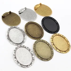 30x40mm oval alloy brooch bases with floral relief in bronze, gold, silver, and black