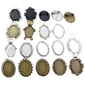 Vintage oval alloy pendant bases and brooch settings in bronze and silver finishes