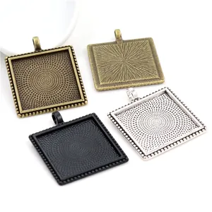 25mm square alloy pendant bases with beaded edges in bronze, gold, silver, and black