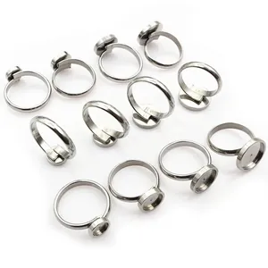 Set of 12 adjustable stainless steel ring blanks with flat round bezel trays for DIY jewelry