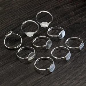 Set di 9 basi per anelli regolabili in argento per gioielli fai-da-te su legno