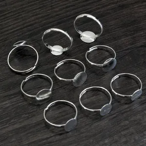 Set di 10 basi per anelli regolabili color argento per la creazione di gioielli fai-da-te