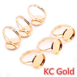 Set of six adjustable KC gold plated round flat base rings for DIY jewelry making