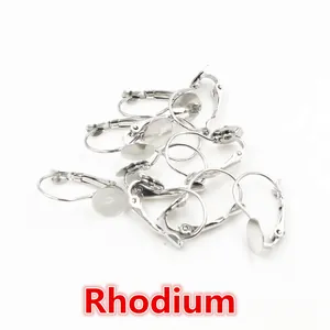 Detail showing 8mm leverback ear hooks with flat base tray in rhodium finish