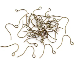 Macro shot of bulk antique bronze fish hook ear wires for DIY earring making