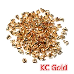 Macro shot of bulk KC Gold bullet ear backs for handmade DIY jewelry earring making