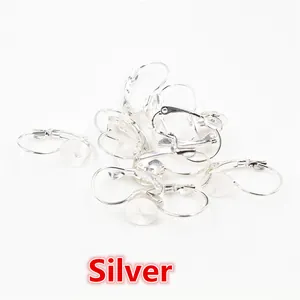Detail of silver DIY French earring hooks with flat base tray for jewelry making