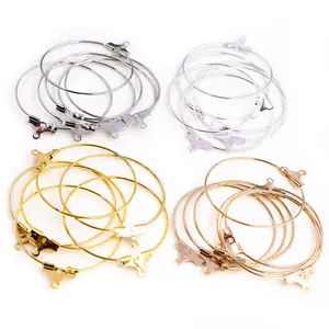 Macro detail of DIY earring hoops in gold, silver, rose gold, and platinum finishes