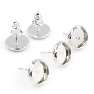 Macro view of silver stainless steel earring posts with bullet backs for DIY jewelry