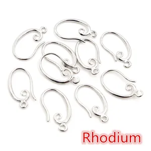 Detail view of 10 rhodium-plated copper ear hooks with spiral coils and jump rings