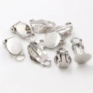 Macro detail of silver plated 10mm flat pad ear clips for DIY earring jewelry making
