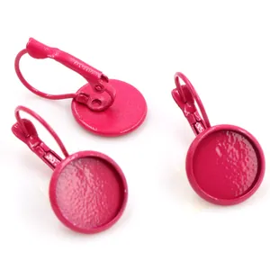 Macro view of hot pink 12mm leverback earring trays for DIY cabochon jewelry making