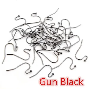 Macro shot of gun black French ear hooks with small round beads for DIY jewelry making
