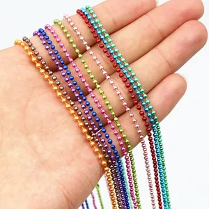 65cm colorful metal ball chains for DIY jewelry making held in hand on white background