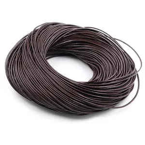 Detail view of 1-2mm dark coffee genuine leather cord in a neat roll for DIY jewelry