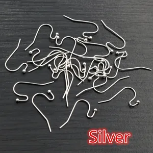 Pile of silver S-shape earring hooks with ball head for DIY jewelry making