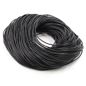 Detail view of coiled black round leather cord for DIY jewelry making and necklaces