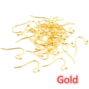 Macro shot of 21x16mm gold-plated S-shape ball head ear hooks for jewelry making