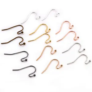Macro detail of various metallic plated S-shape ear hooks for DIY earring making