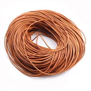 Close-up of brown genuine leather round cord roll for DIY jewelry making and crafts