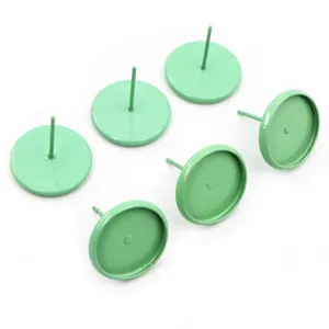 Macro view of mint green 10mm stud earring tray bases for DIY jewelry making