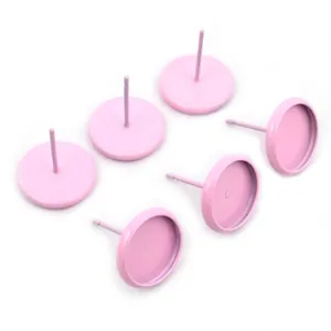 Close-up of 6 pink matte 10mm tray earring posts for DIY handmade jewelry components