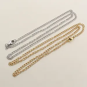 Close-up of gold and silver stainless steel necklace chains with lobster clasps for DIY
