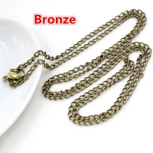 Detailed view of 70cm bronze chain with lobster clasp on a white plate for DIY necklaces