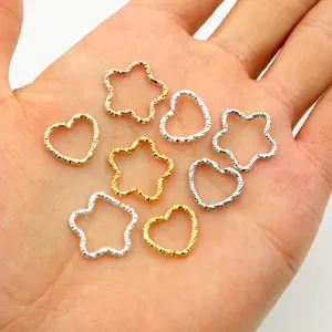 Textured gold and silver heart and star shaped metal jump rings for DIY jewelry making