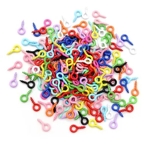 Macro view of colorful screw eye pins set for jewelry making and DIY crafts