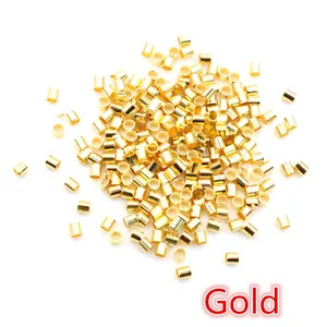 Macro shot of 500 pieces bulk golden jewelry crimp beads for DIY bracelet making