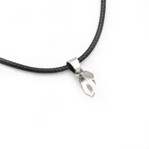 Detail of silver stainless steel pendant bail connector on a black woven cord necklace