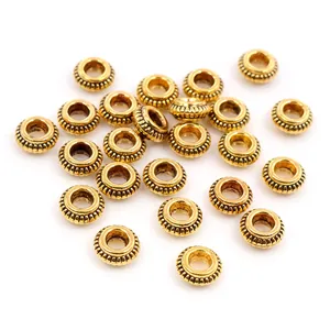Cuentas espaciadoras doradas de 5 mm con forma de rueda para creación de joyas DIY