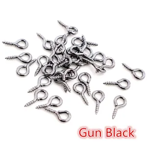 Detailed view of bulk gun black eye pin screws for DIY pearl jewelry making