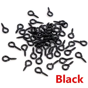 Macro shot of small black metal eye screw hooks for DIY jewelry making and crafts