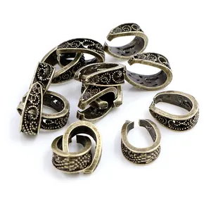 Baroque alloy pinch bails for pendants with antique bronze finish and intricate patterns