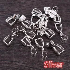 Macro detail of silver plated copper pinch bails for DIY jewelry making accessories