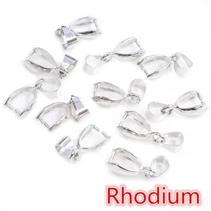 Detailed macro view of rhodium-plated silver pendant clips for jewelry making DIY