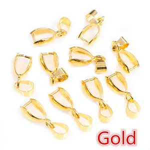 Detailed view of polished gold teardrop pendant bails for jewelry DIY necklace making