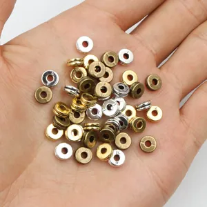 Mezcla de cuentas planas de metal 6x2,5mm para creación de joyas DIY en la palma