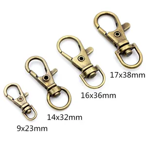 Set di quattro moschettoni in bronzo antico di varie dimensioni per portachiavi fai-da-te