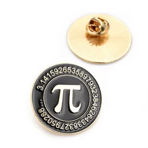 Macro view of a round black enamel Pi symbol badge with gold plated back and butterfly clasp