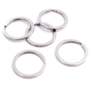 Close-up of five flat stainless steel split key rings for DIY jewelry making