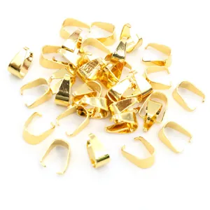 Macro shot of gold-plated stainless steel pinch bails for DIY jewelry making