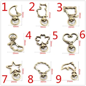 Various bronze alloy lobster clasps in 9 animal shapes with detailed size measurements