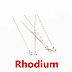 Macro detail of 16-50mm Rhodium eye pins for DIY jewelry making and earring assembly